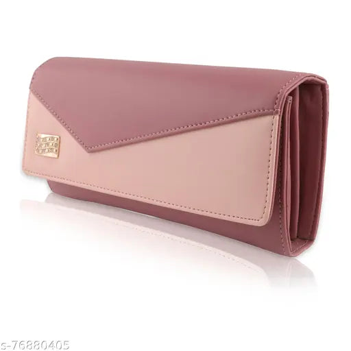 Pink women's fashion clutch purse with visible zip closure, wallet size, and fabric texture
