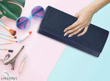 Blue leather clutch purse with multiple card slots, rectangular design