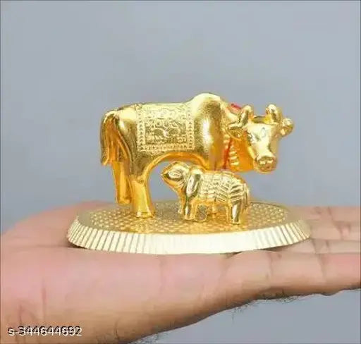 Gold metal Kamdhenu cow with calf