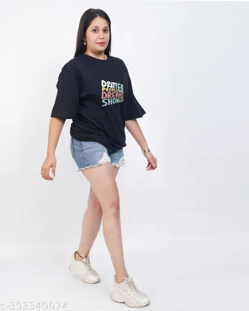 Female oversized black t-shirt, printed with text