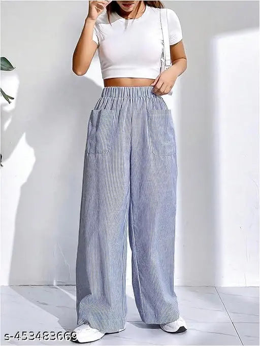 A person wearing blue and white checkered trousers
