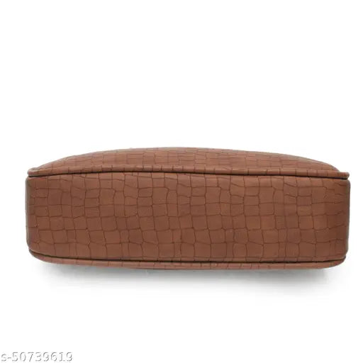 Dark brown faux leather purse with adjustable strap and spacious main compartment