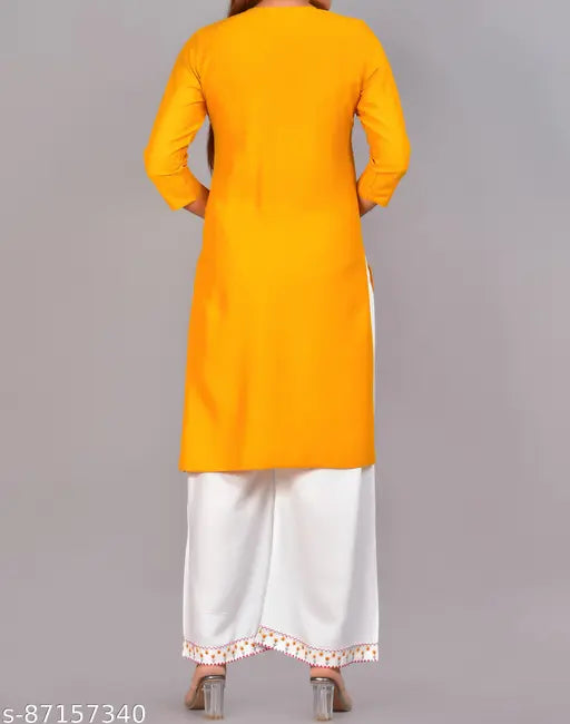 Rayon Kurta & Palazzos Set, embroidered net three-quarter sleeve Indian women's fashion on mannequin