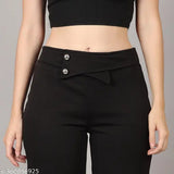 Black high waisted trousers with bow detail and pockets