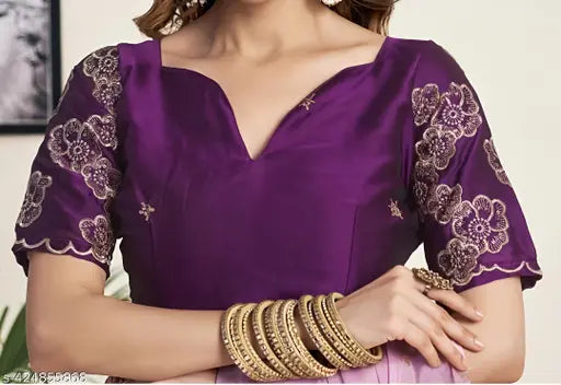 Elegant Bollywood-inspired pink-beige chiffon saree with embroidered net pallu, perfect for party wear and suitable for various occasions. Accompanying separate art silk blouse piece for custom styling