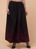 Black cotton flared digital print long skirt with elastic closure by Hive91 - Elevate your style with this comfortable and stylish black skirt featuring a unique digital print pattern. Perfect for adding a touch of timeless elegance to any outfit, available in sizes 26 and 32 (waist size: 26/32 inches, length size: 36 inches). Handcrafted in India