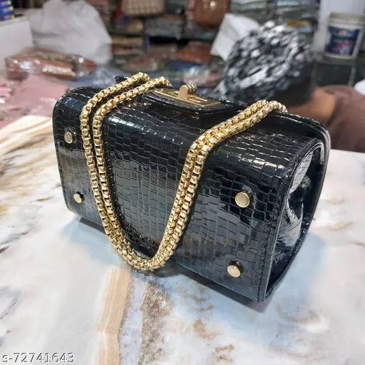 Leather crocodile embossed sling bag with gold chain accent