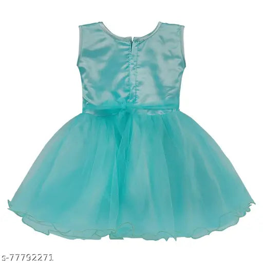 A silver baby girl's frock dress with a V neckline and short puff sleeves