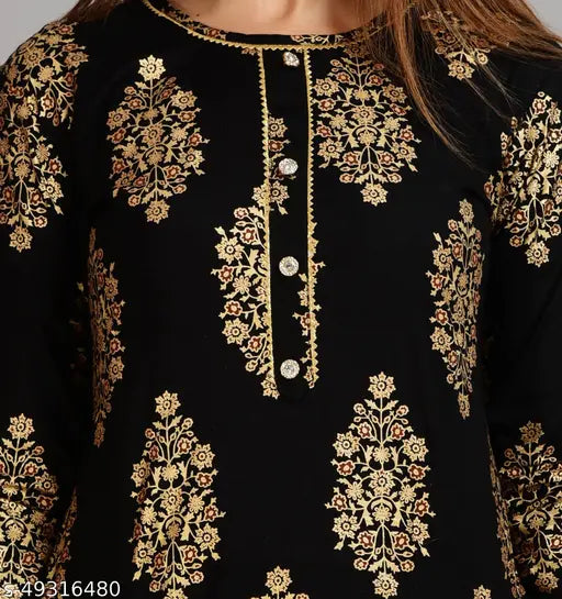 Rayon gold print stitched kurti set with palazzos, Indian festive wear on mannequin