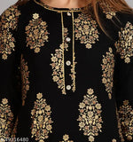Rayon gold print stitched kurti set with palazzos, Indian festive wear on mannequin