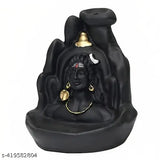 Black marble smoke fountain with embedded metal statue of Lord Shiva