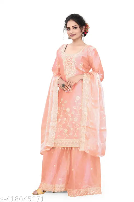 Coral pink salwar suit with dupatta and embellished design