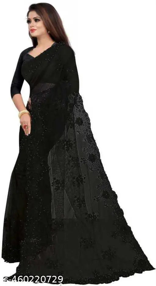 Black net embroidery saree, intricately embellished Indian traditional garment with separate silk blouse piece on mannequin