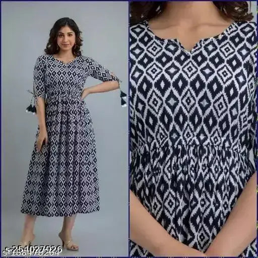 Classic blue cotton kurti, three-quarter sleeves, printed combo. High-quality cotton for comfort and breathability. Perfect for work or casual outings. #BlueCottonKurti #ClassicStyle #ComfortableFashion #IndianHandicrafts