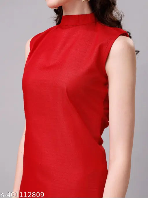 Red cotton blend sleeveless kurta and palazzo set with embellished net detail, perfect for party wear and festive occasions. Made in India
