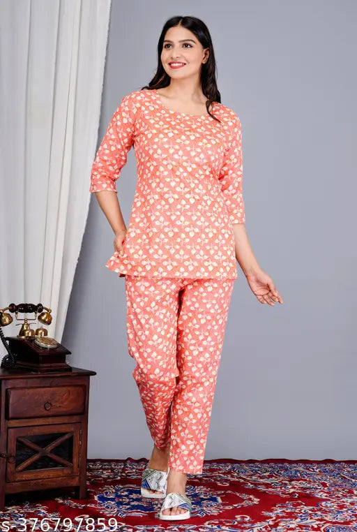 Comfortable cotton printed night suit top & pyjama set with floral all-over print, 3/4 sleeves, and notch neck from KIYA FASHION