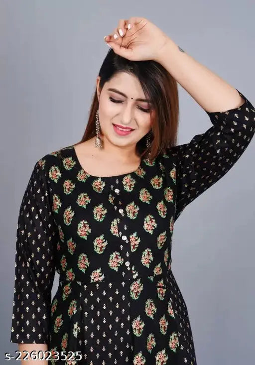 Black flared Kurta with gold print on viscose rayon fabric for women's fashion, trendy three-quarter sleeve design, Indian origin