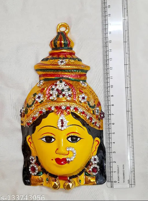 Ceramic yellow Varalakshmi God Idol, richly decorated with embedded jewellery, measures 10"x2"x3