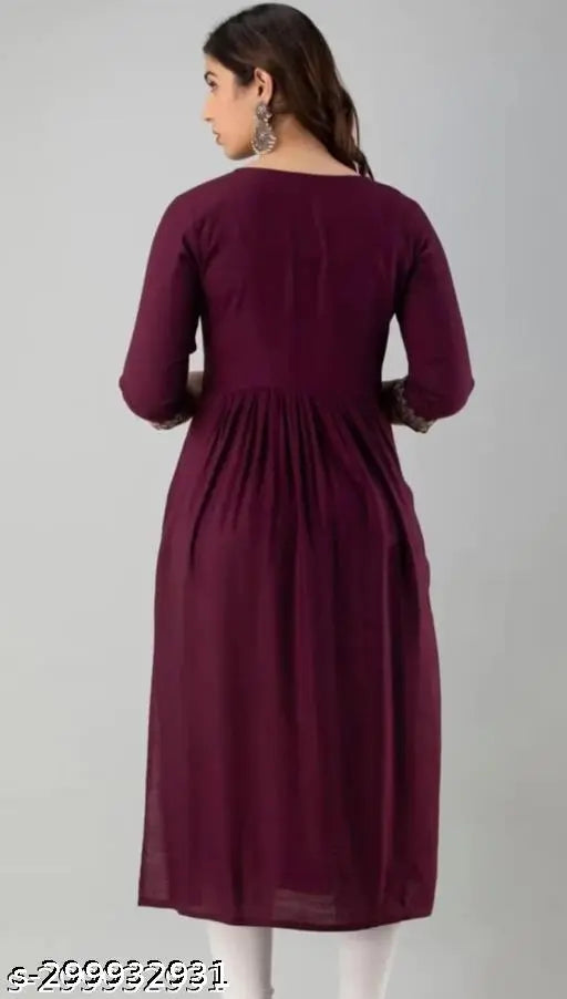 Rayon Nayra cut kurti with heavy embroidery, solid three-quarter sleeve Indian women's fashion for plus sizes on display