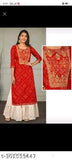 Red kurta with puff sleeves, long length, intricate embroidery on front and back panels