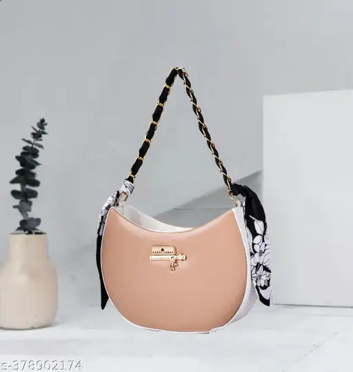 Stylish sling bag, white with black trim and a yellow chain strap