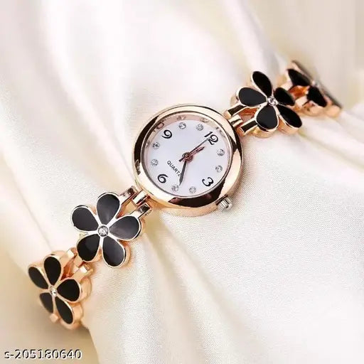 Fashionable women's analog wristwatch with flower pattern and white face, featuring a gold-tone bracelet and white leather strap, suitable for casual wear or gifting