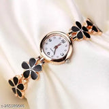 Fashionable women's analog wristwatch with flower pattern and white face, featuring a gold-tone bracelet and white leather strap, suitable for casual wear or gifting