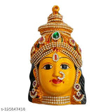 Stone-decorated metal Varalakshmi idol for Varamahalakshmi Pooja, showcasing Goddess Varalaksmi's face mask in India