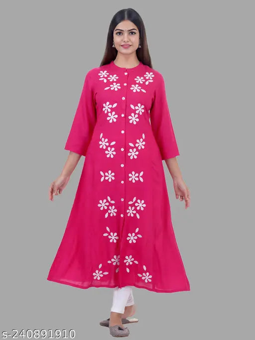 Pink rayon three-quarter sleeve embroidered partywear kurti for women, embellished with intricate work, suitable for any occasion