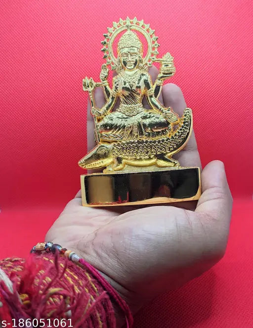 Golden metal idol of Shri Ganga Mata, holding conch and trident