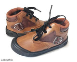 Brown suede kids shoes with lace-up closure