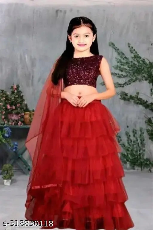 Velvet and net embellished semi-stitched lehenga choli for girls, available in multiple sizes from 1-13 years. Indian designer product