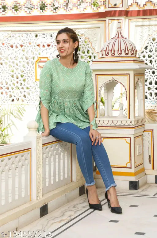 Rayon three-quarter sleeve tunic, fancy glamorous partywear for women. Printed combo in L (Bust 40in, Length 26in), XL (Bust 42in, Length 26in), XXL (Bust 44in, Length 26in). Bhairav Fashion India