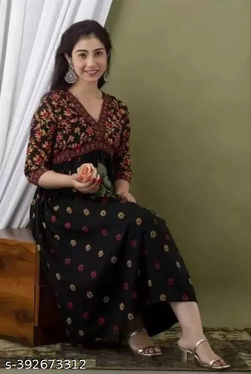 Women's black Anarkali kameez with floral print, long sleeves, and fitted silhouette for party wear, ethnic design