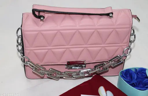 Pink slingbag, 1 adjustable shoulder strap, handheld handle