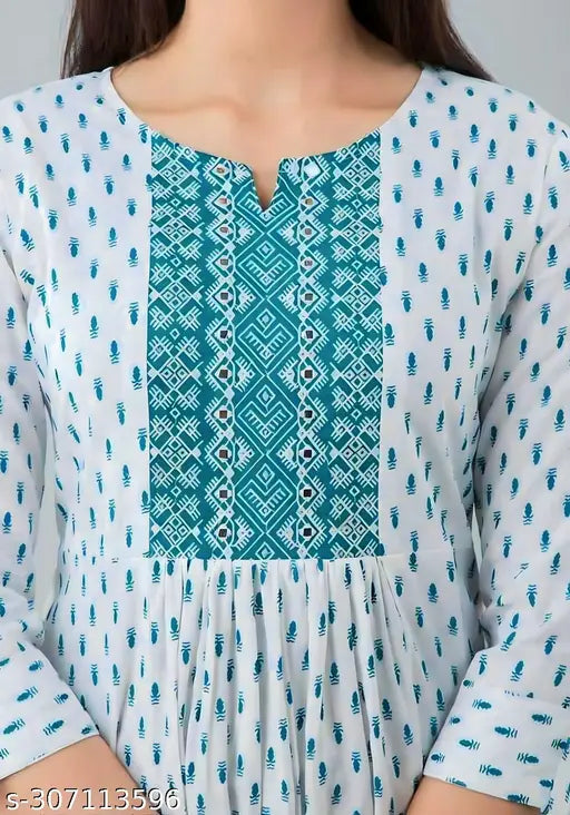 Rayon printed Anarkali kurta with embroidery, three-quarter sleeves, and vibrant pomegranate design - Indian women's wedding dress on display