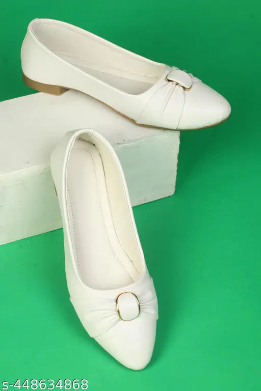 White satin heels with gold buckles