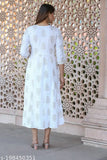 Rayon embroidered sequinned Anarkali kurti, white with gold print, three-quarter sleeves. Indian party wear for women