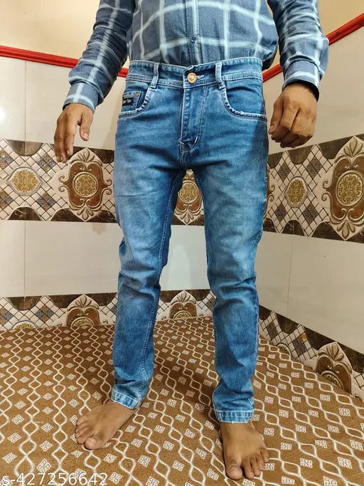 Men's dark blue denim jeans with button fly and belt loop