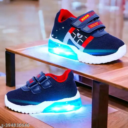Blue & Red LED-lit durable sneakers for kids (0-7 years), made from breathable canvas and rubber. Unisex design with adjustable Velcro closure ensures a secure fit