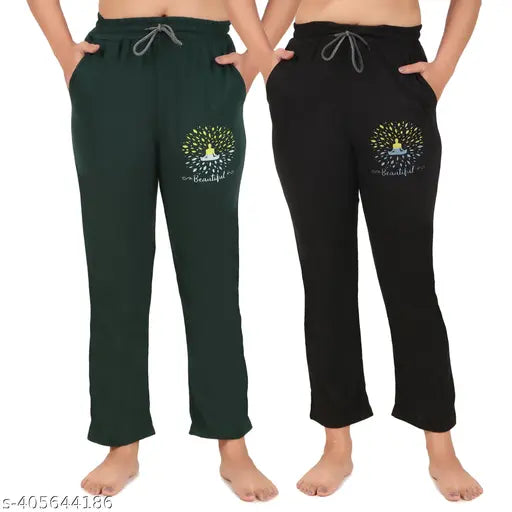 Women's trendy green jogging pants with drawstring waistband, black cropped sweatpants with white drawstring waistband and logo