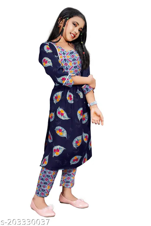 Printed rayon kurta set for girls, straight top with three-quarter sleeves and trousers bottoms. Available in sizes 4-5 years to 13-14 years. Indian origin