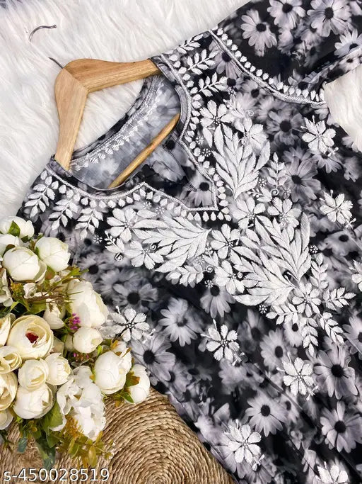 Black cotton chikankari printed kurta and palazzo, intricate Indian hand-embroidered long sleeve set on mannequin