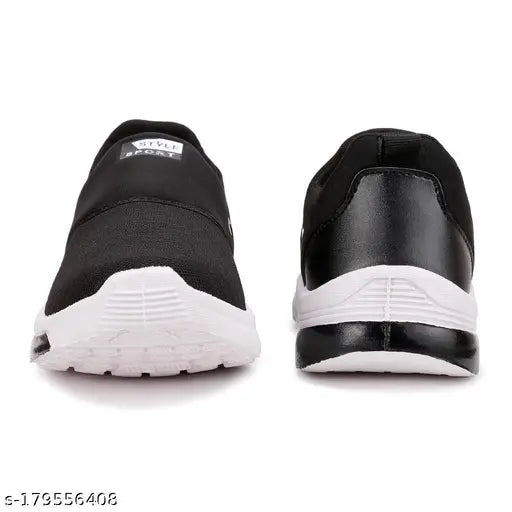 Black and white sneaker, featuring a pull tab and lace-up closure