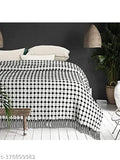 Cotton throw bedcover in black and white with geometric design