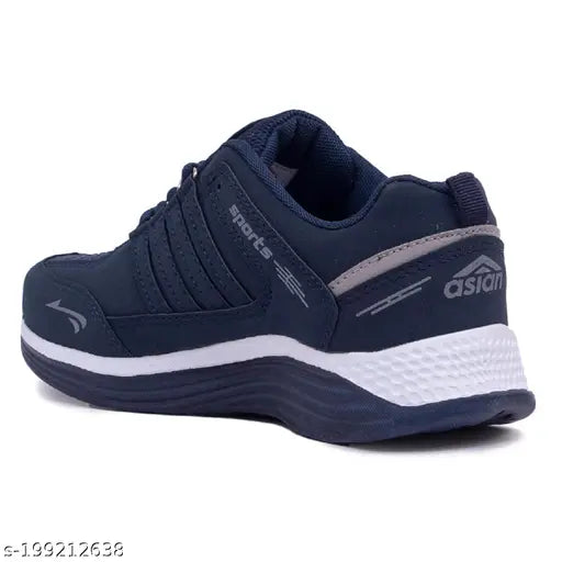 Dark blue gym shoes with white sole, designed for kids' sports activities