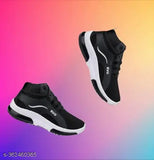 Black and white sneakers with a velcro strap
