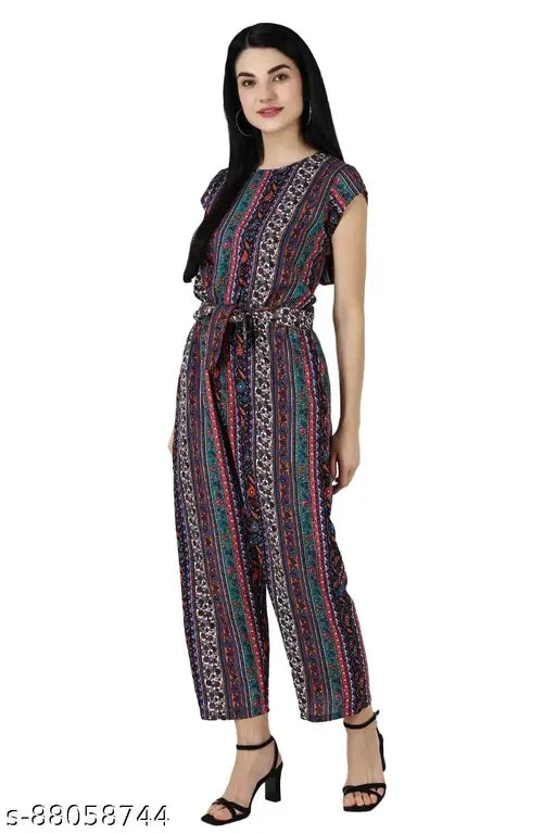 Printed net, sleeveless jumpsuit with halter neck, 100% polyester. Slim fit, wide leg design. Hand wash only. Model: 5'9", size S. Made in India
