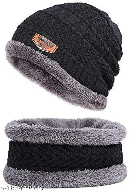 Black and grey knit cap, beanie style, with a visor. Includes a pair of black fingerless gloves