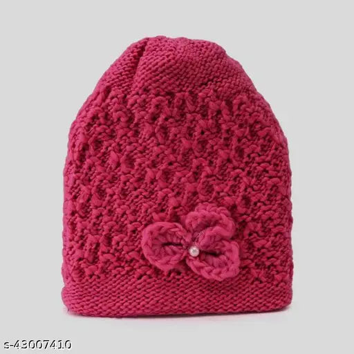 Pink crochet beanie with floral trim